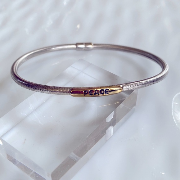 SARDA Sterling Silver and Gold Peace Bracelet
Magnetic clasp - Picture 1 of 5